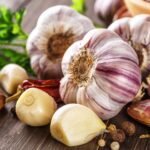 Know benefits and side effects of eating garlic
