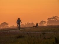 riding a bike at dusk scaled 1 1400x1050 1 1100x825 1